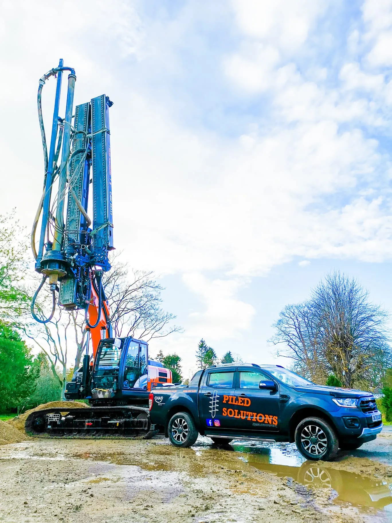 A truck with a crane on the back of it.